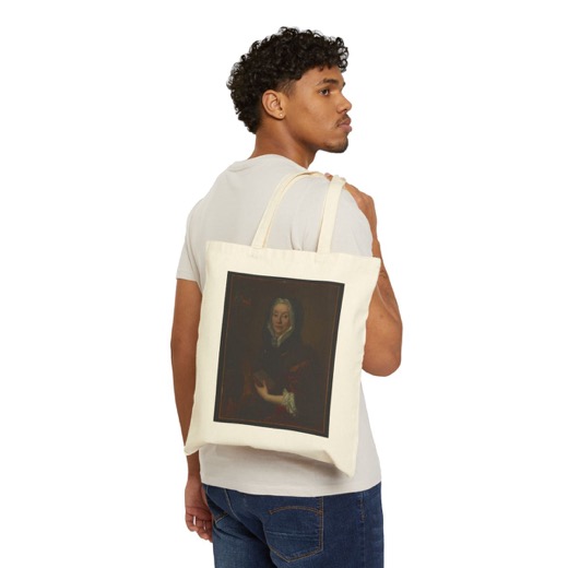 Portrait of a Woman Holding a Book on Natural canvas tote, worn.